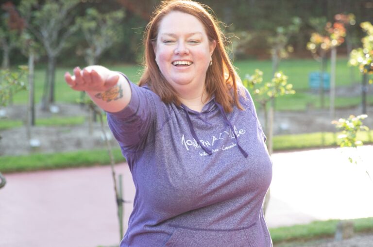 A person doing yoga outside.