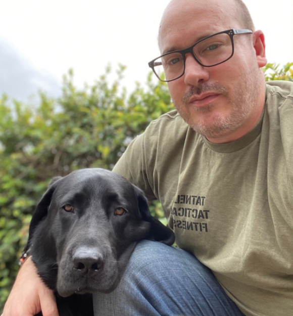 James and Zenda sitting outdoors together