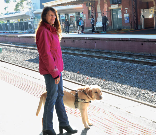 Melaine and Dessau standing at the train station