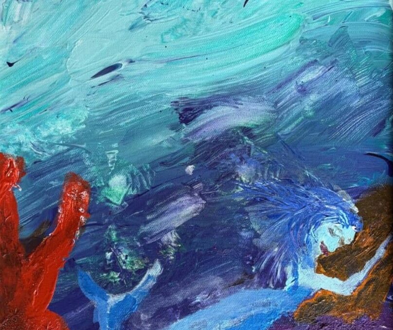 Colorful underwater painting of a mermaid swimming near the ocean floor, surrounded by abstract coral and water in shades of blue, turquoise, red, and purple.