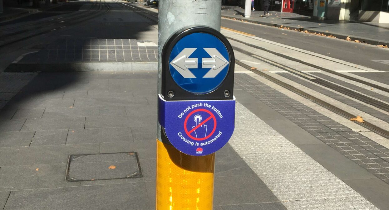 Audio tactile pedestrian button covered.