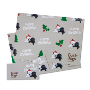 Guide Dogs branded Christmas wrap and tags.
