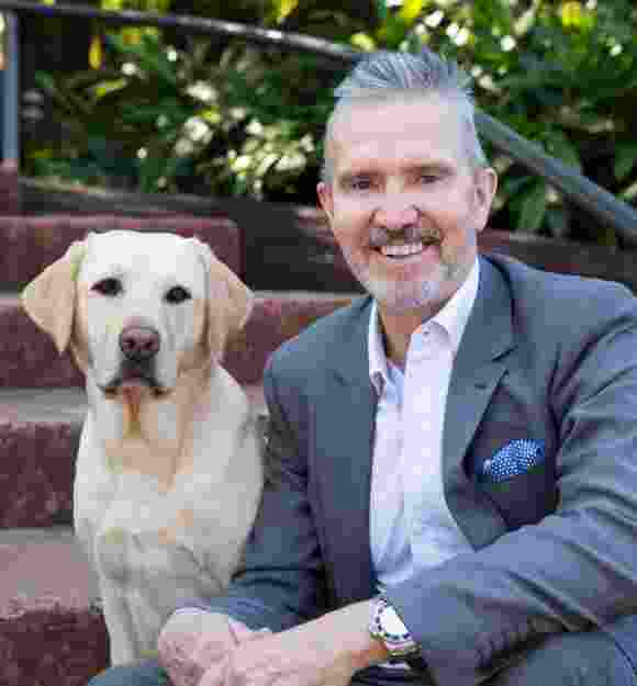 Dale Cleaver with yellow labrador.