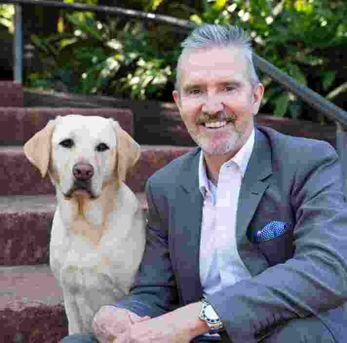 Dale Cleaver with yellow labrador.