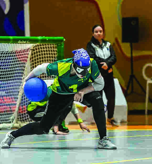 Zara playing goalball.