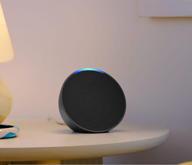 Amazon Alexa sitting on a side table.