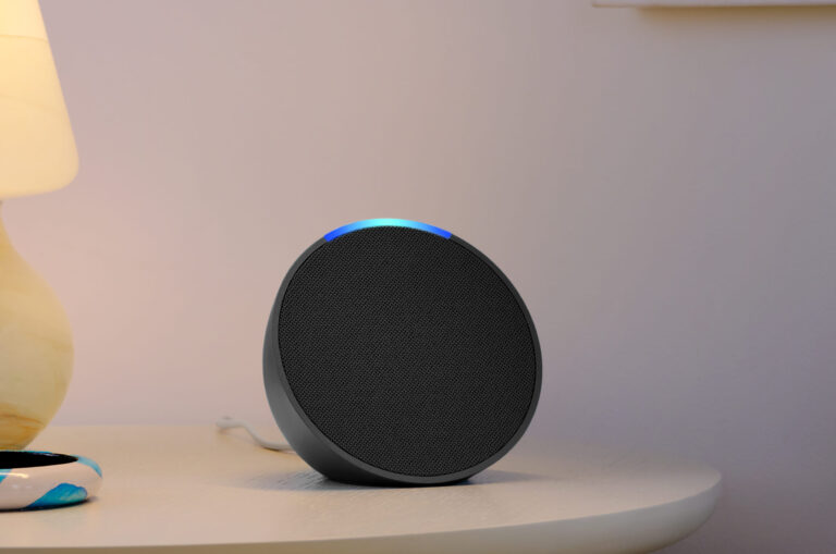 Amazon Alexa sitting on a side table.