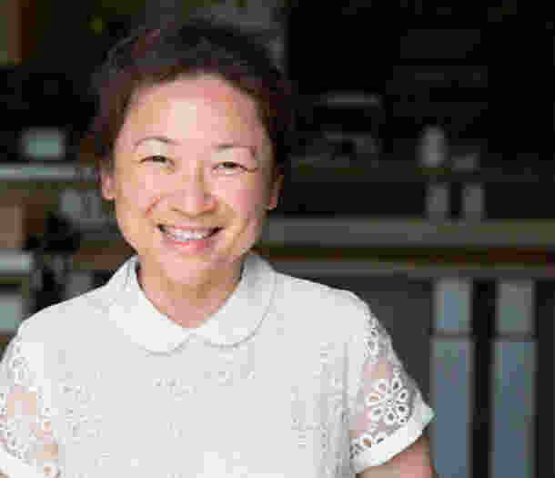 A person smiling at the camera.