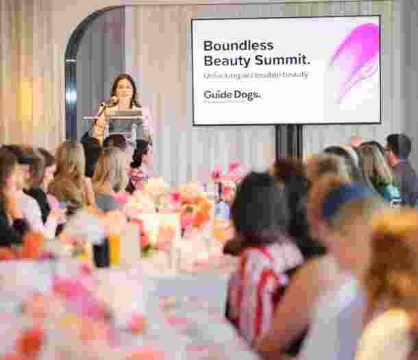 Nas Campanella speaking at the beauty summit event.