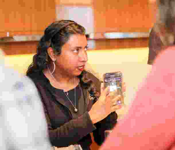 Assistive tech specialist demonstrating Voice Over.