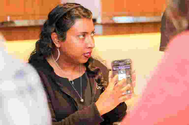 Assistive tech specialist demonstrating Voice Over.