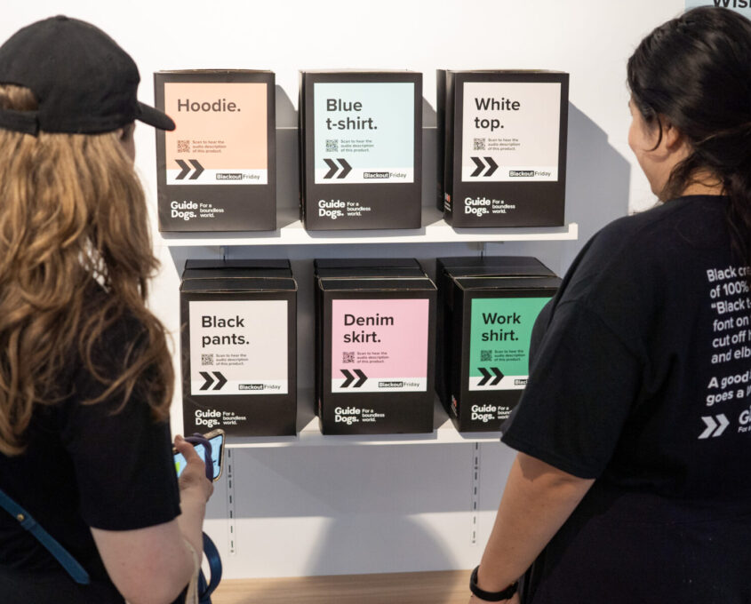 Two people looking at poor product descriptions.
