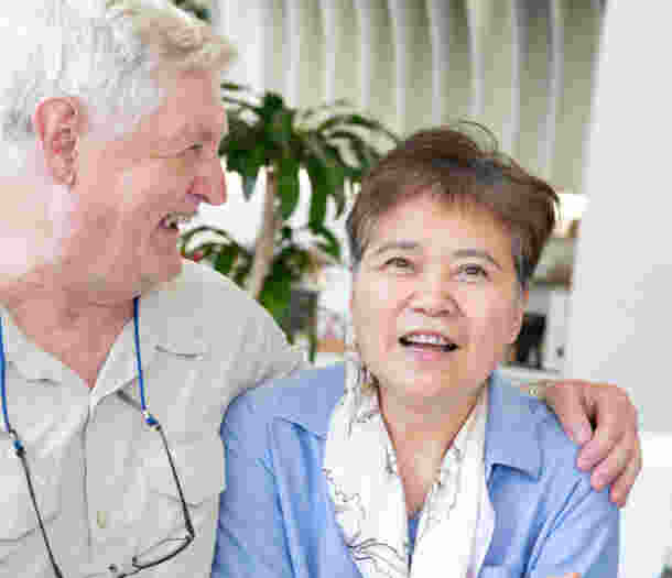 Two people laughing together,