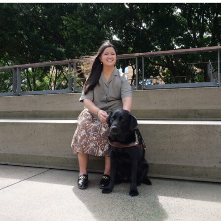 Big paws to fill during the transition from her first to second Guide Dog: Ria and Guide Dog, Trinity.