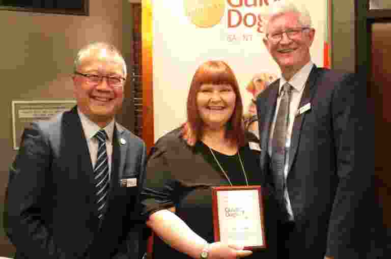 Aaron and John present Kate with her award for Honorary Life Membership.