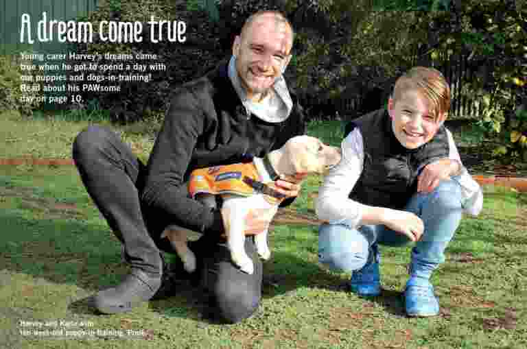 Paw Prints Autumn 2020 cover shows a man holding a puppy besides a smiling young boy.