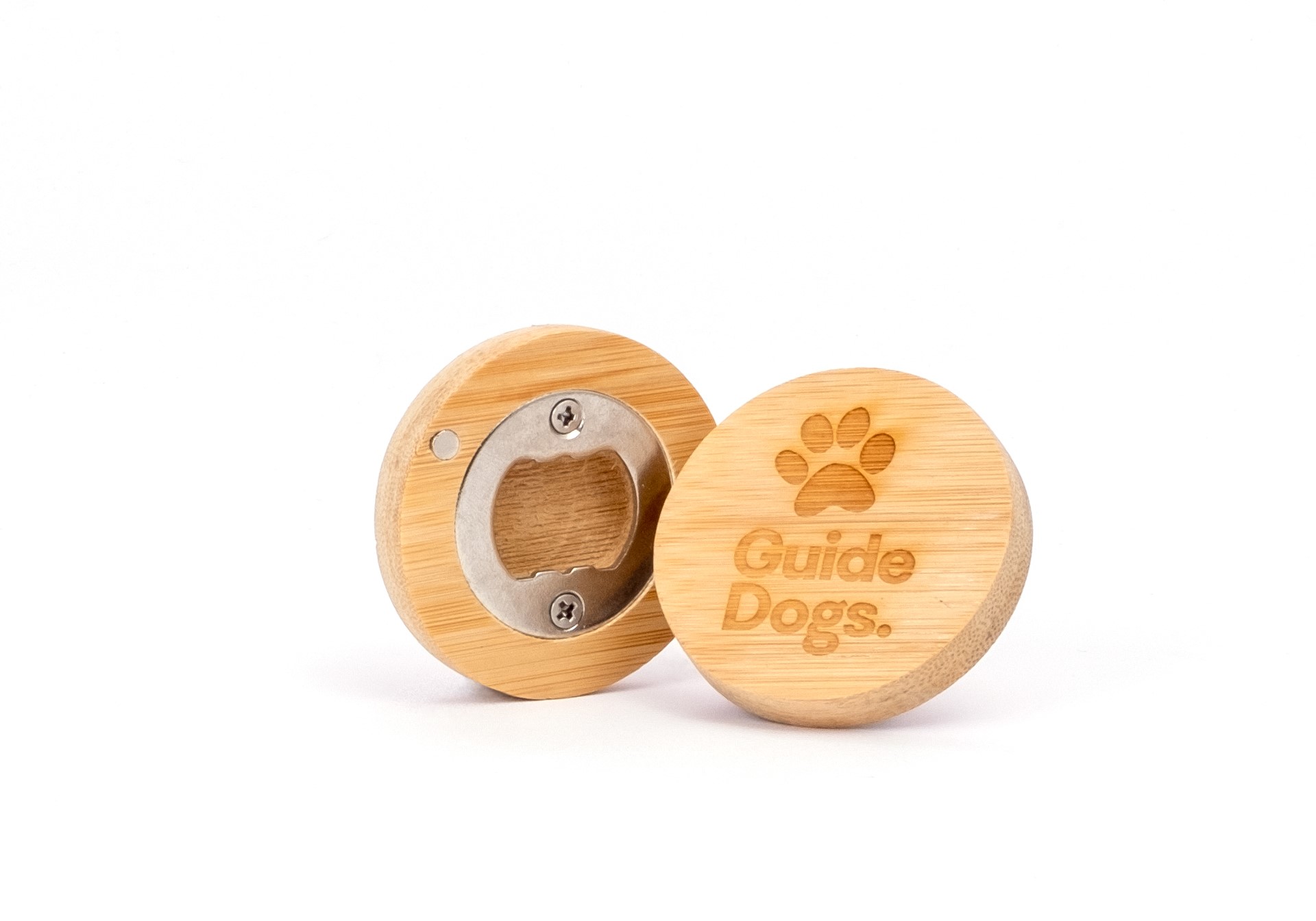 Wooden bottle opener with Guide Dogs and a paw print engraved on the top, shown in two sections: one with the metal opener and one with the engraving.