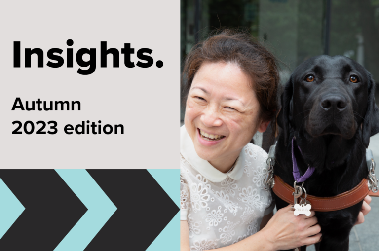 A woman smiling next to a black Labrador wearing a collar. Text reads, Insights. Autumn 2023 edition.