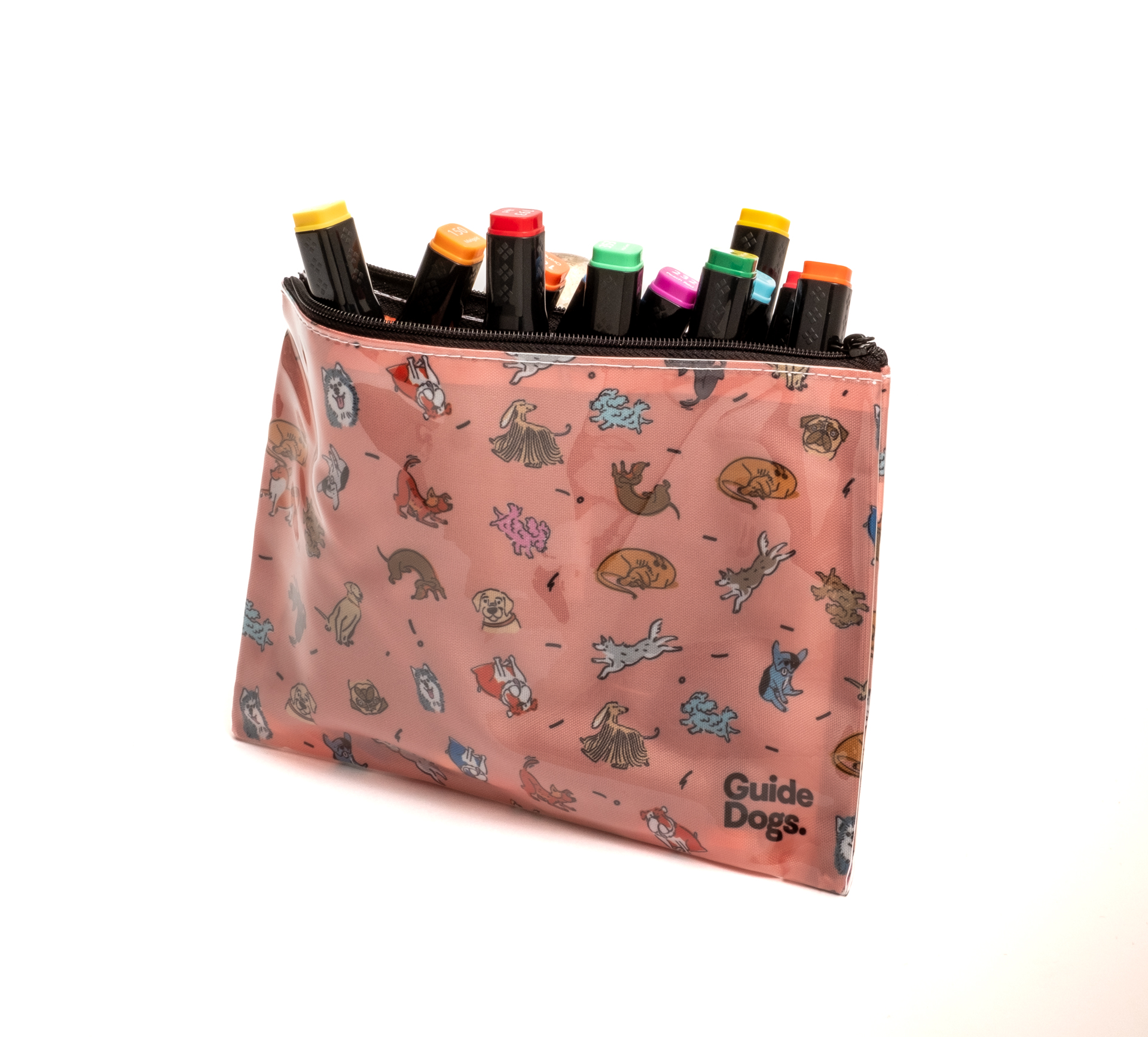 A pink zippered pouch with cartoon animal illustrations, filled with colorful markers, and the words Guide Dogs printed at the corner.