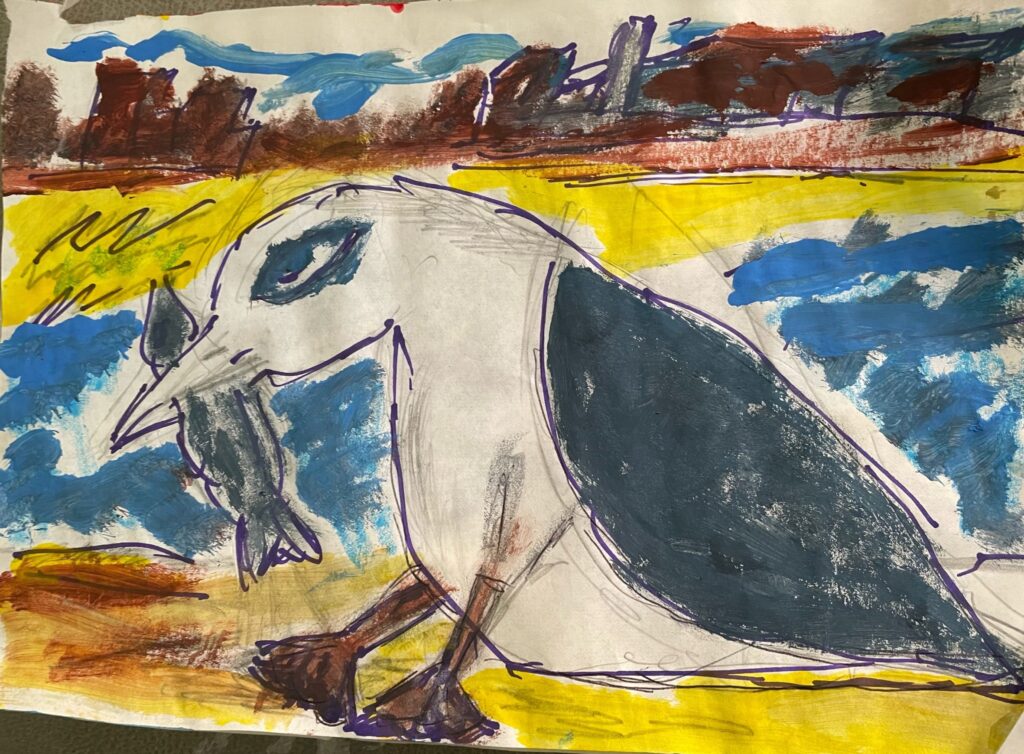 A painting of a seagull with a fish in its mouth. The seagull is standing on yellow sand with blue water in the background.