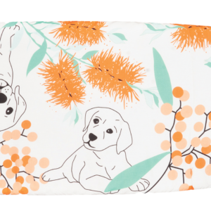 Ironing board cover featuring floral illustrations of puppies and the phrase "Guide Dogs.