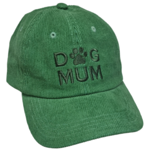 Green corduroy cap, with “DOG MUM” embroidered and a paw print between the D and G.