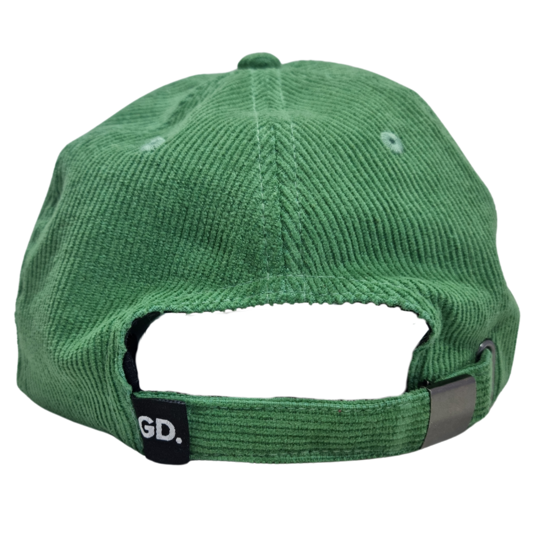 View of the Green Corduroy Cap from the back, featuring an adjustable strap with a metal buckle and GD. initials at the strap end.