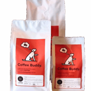 Three white and red bags labeled Soho Coffee and Hot Chocolate with a cartoon dog logo, arranged in front of each other on a plain background.