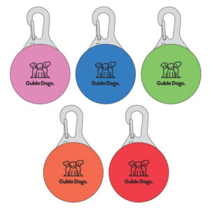 Five Clip on LED Lights in pink, blue, green, orange, and red, each featuring a Guide Dogs logo and a metal clip at the top.