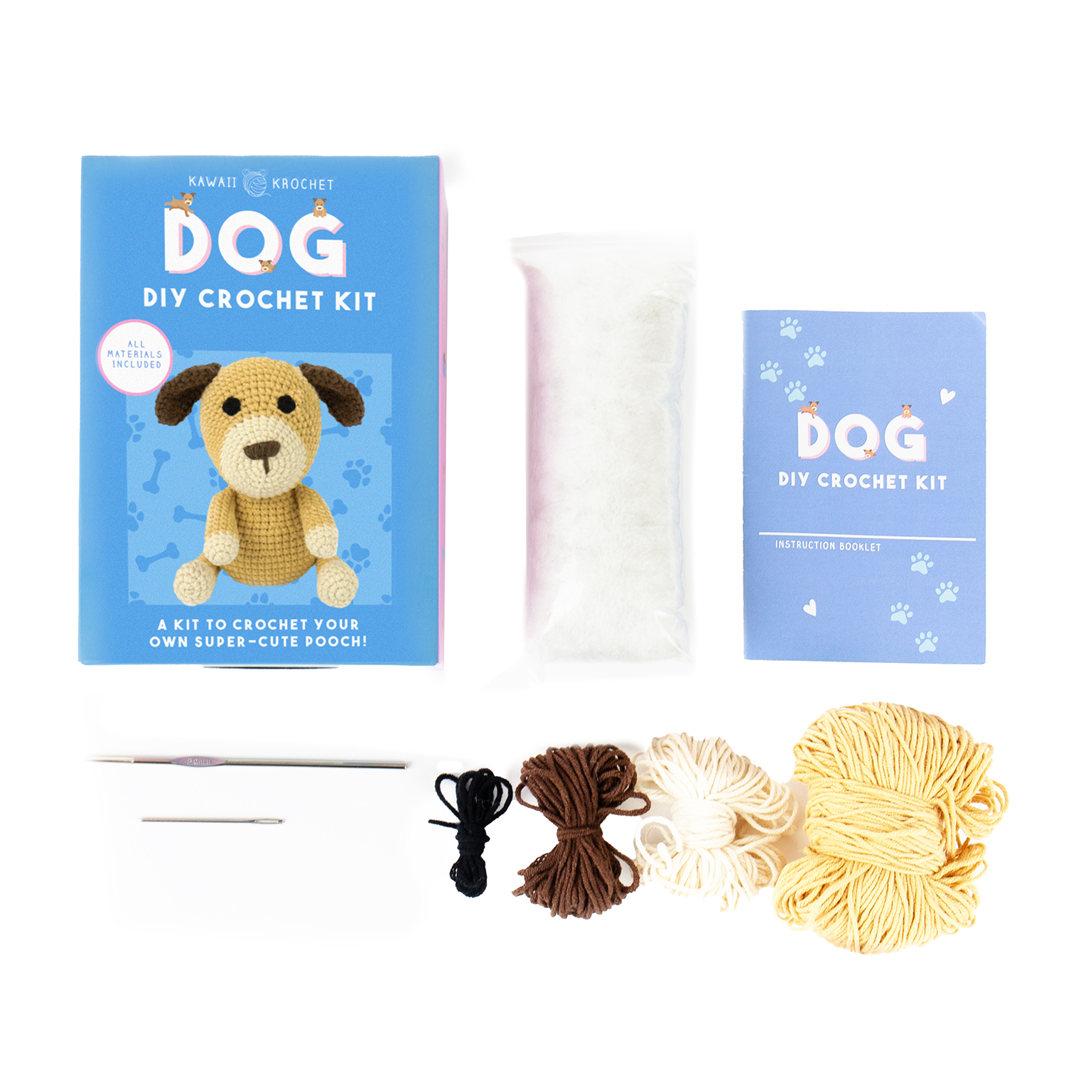 Crochet Kit includes a pattern box, instruction booklet, stuffing, crochet hooks, needles, black, brown, yellow and cream yarns, plus a white cord—all contents laid out for easy DIY dog crafting.