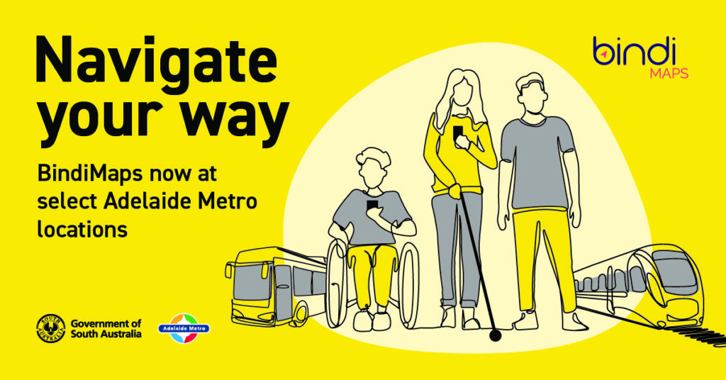 A bright yellow graphic banner shows a fine line illustration of three individuals 'navigating their way' using their phone, with a bus and a train next to them. Text readsw: Navigate your way. BindiMaps now at select Adelaide Metro locations.