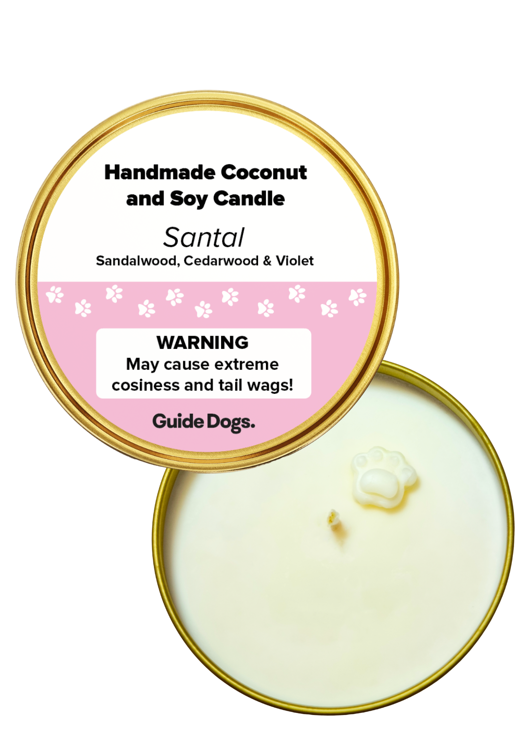 Top view of the Candle Tin - Gold, a handmade coconut and soy candle featuring a paw-shaped wax detail at the center, a lid labeled “Santal” scent, and a warning about extreme cosiness.