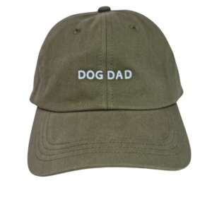 Olive green Caps featuring "DOG DAD" embroidered in white on the front.