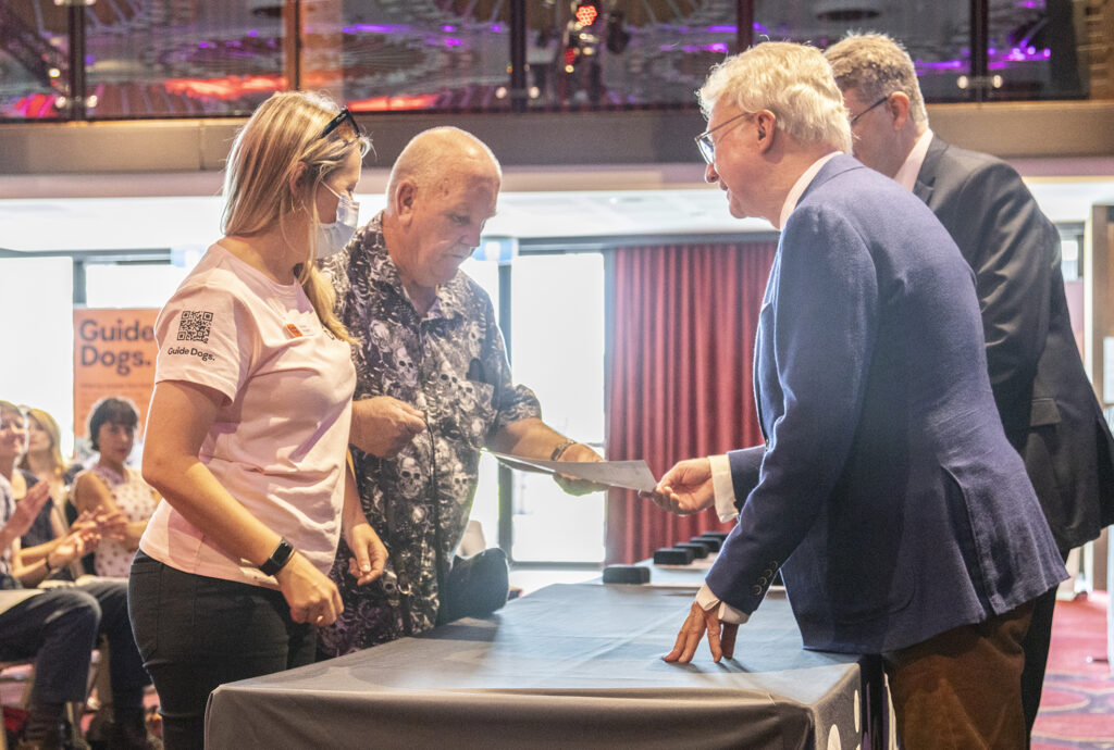 Peter Young and GDMI Cadet Nicole on the left, former Governor, the Honourable Paul de Jersey AC CVO, and David Swain on the right.