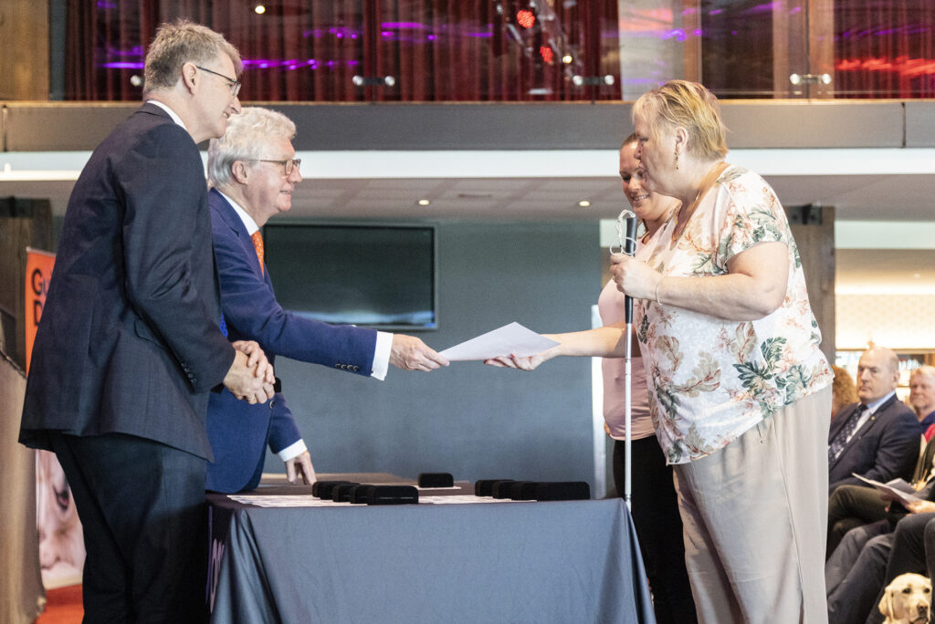 Deb Venables on the right, former Governor, the Honourable Paul de Jersey AC CVO, and David Swain on the left.