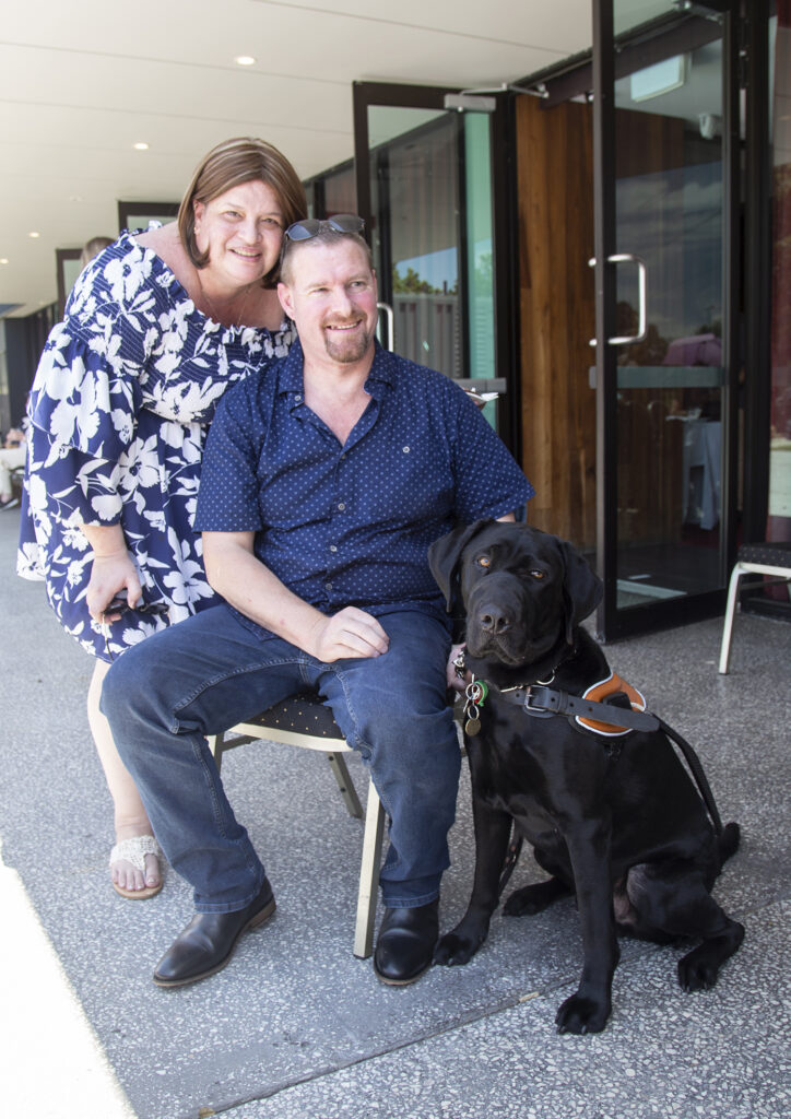 Tim Ray, and Guide Dog Granger and partner.