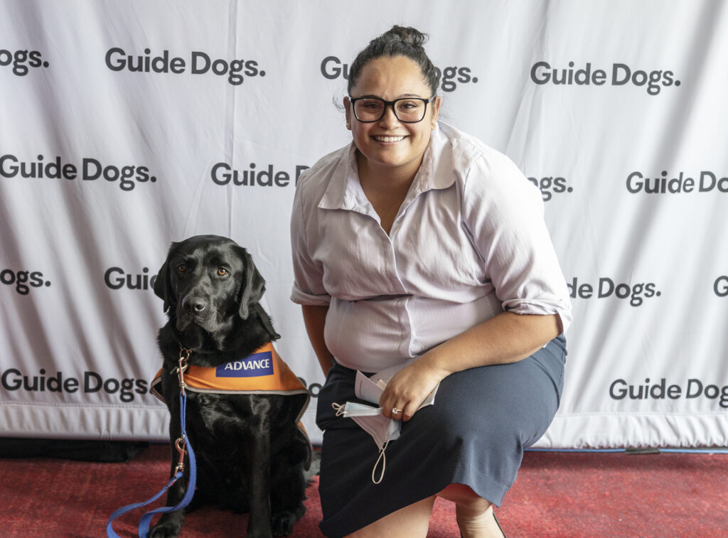 Trainee Support Dog Kobe getting pats at Graduation.