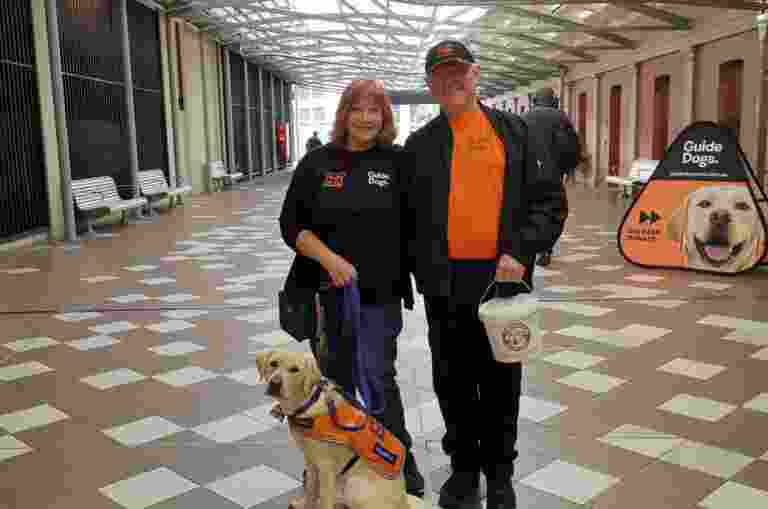 Image of volunteers Ian and Helen and Guide Dog hope