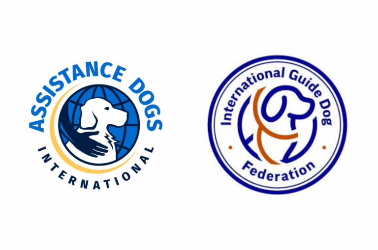 Image shows two logos side by side: the Assistance Dogs International logo featuring a white dog’s profile with a supporting hand over a blue globe, and the International Guide Dog Federation logo with a stylized dog outline in blue and orange inside a circular frame.